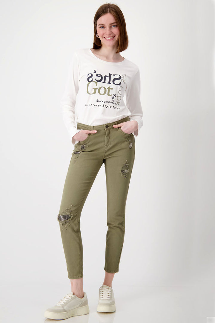 Distressed Denim Jeans with Studs in Green Tea
