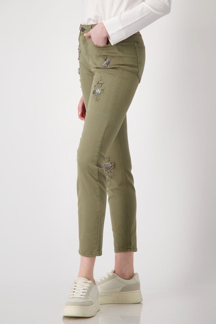 Distressed Denim Jeans with Studs in Green Tea